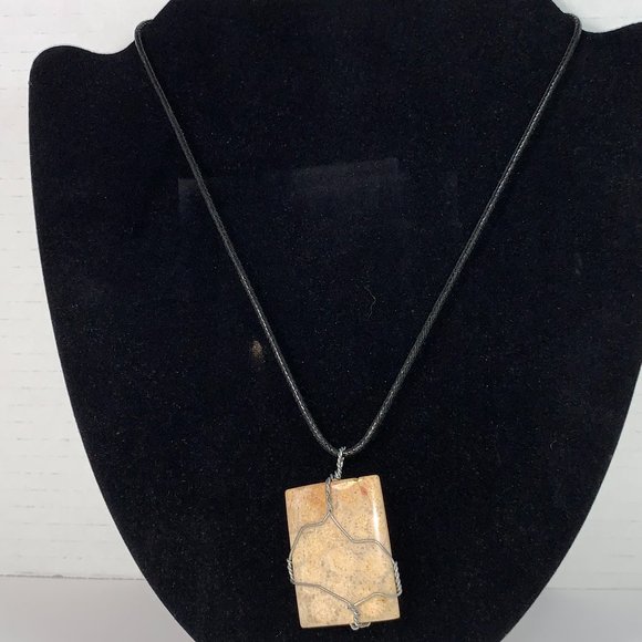 OSP Jewelry - 20" Braided Leather necklace with Wire wrapped Fossilized Coral Pendant